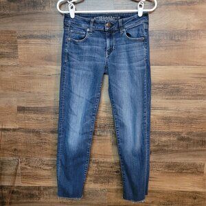 American Eagle Jeans 4 R Skinny Super Stretch Low Rise Raw Hem Medium Light